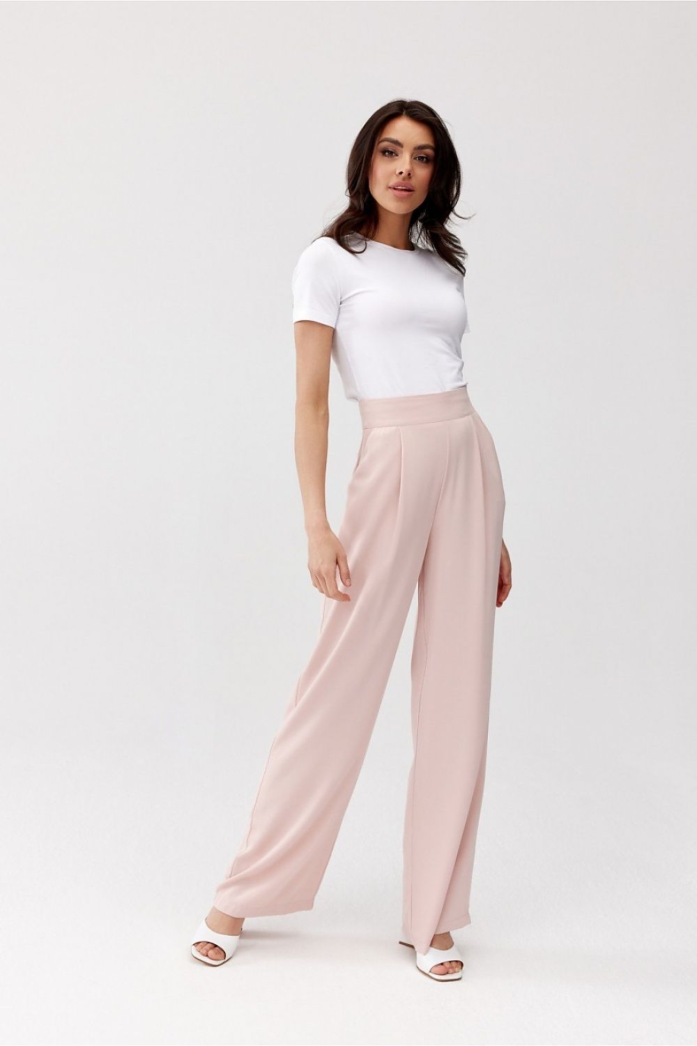 Pantalon large taille haute rose poudré pour femme, coupe élégante et fluide, fabriqué en Europe.