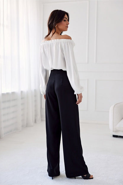 Pantalon noir taille haute pour femme, jambes larges et taille structurée, confection européenne.