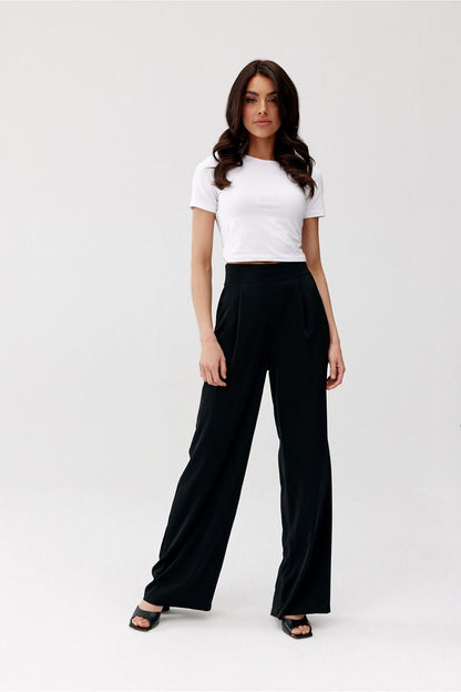 Pantalon noir taille haute pour femme, jambes larges et taille structurée, confection européenne.
